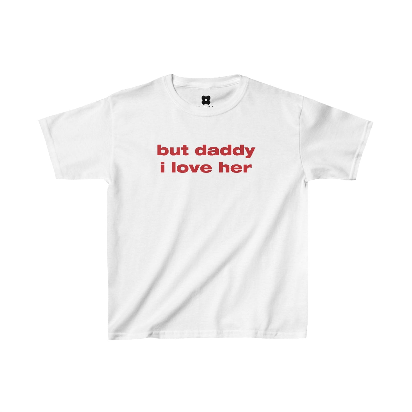 A plain white "But daddy I Love Her Baby Tee" featuring the phrase "but daddy i love her" in red lowercase letters centered on the chest, making it an ideal Lesbian Pride shirt.